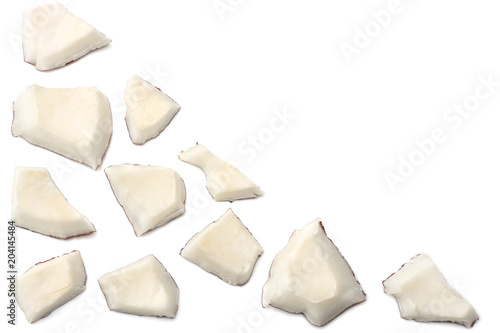 Coconut pieces isolated on white background. top view