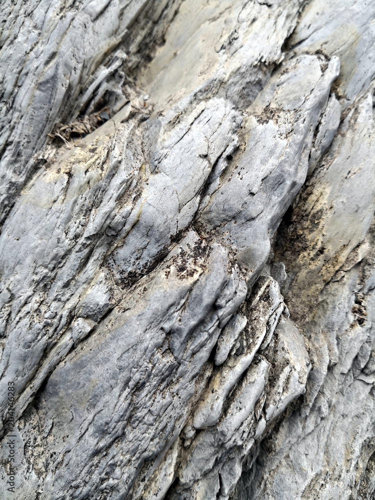 Grey rock erodated by water Grey rock erodated by water
