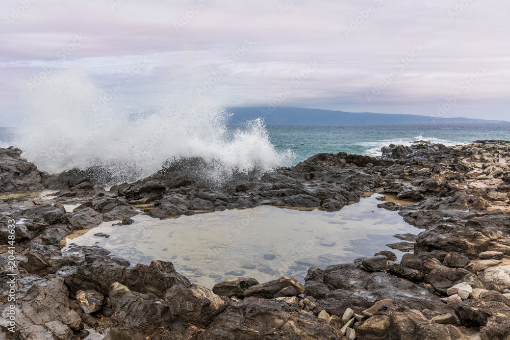 Waves Pound the Rocky Coast of Maui