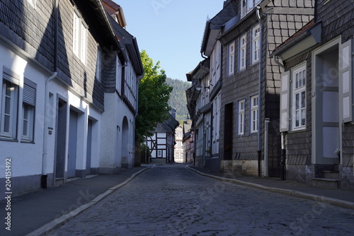 Tiny street with old nordic style houses in the town of Goslar  Germany in the Harz region.