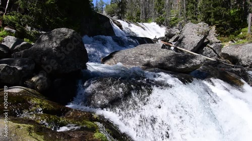 Waterfalls at stream Studeny Potok in High Tatras mountains, Slovakia photo