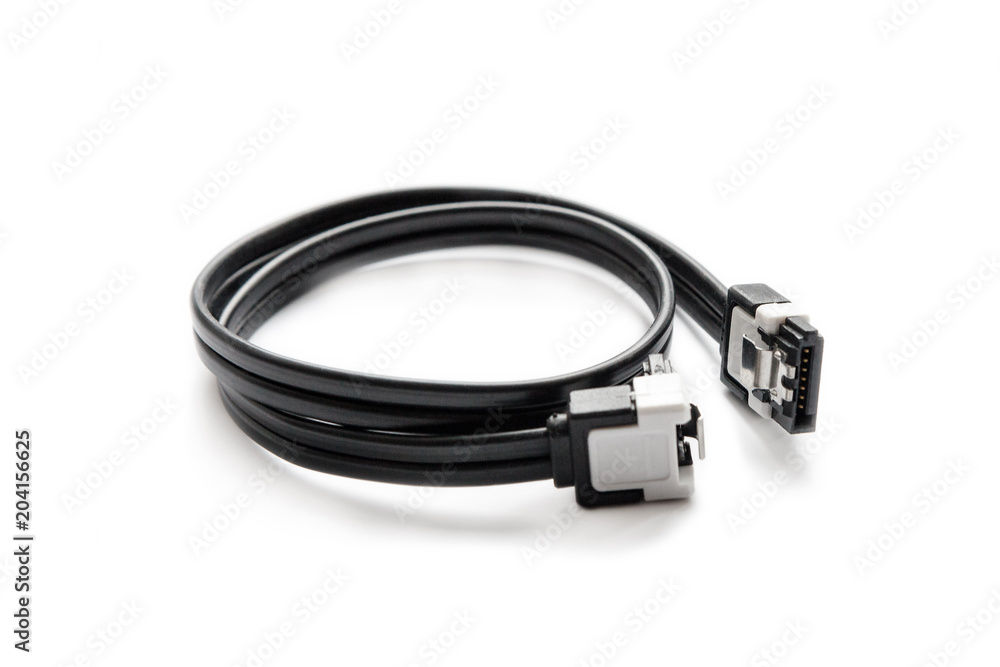 Black SATA cable for connecting a hard drive to the motherboard on a computer on a white background. Black SATA cable for connecting a hard drive to the motherboard on a computer on a white background.