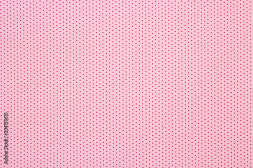 pink polka dots pattern background, top view