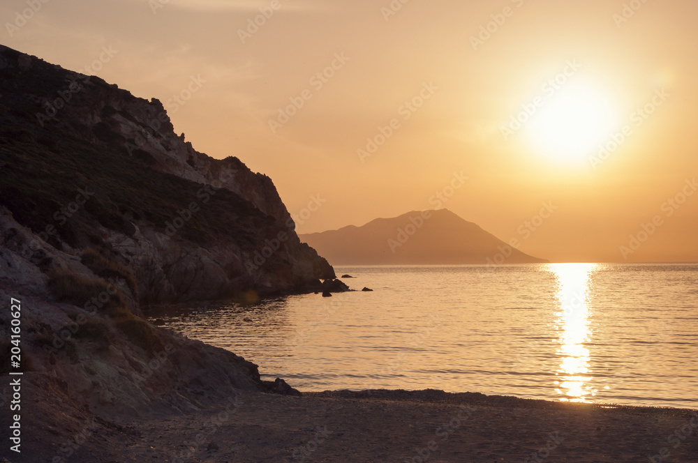 View at sunset from Plathiena beach at Milos island in Greece