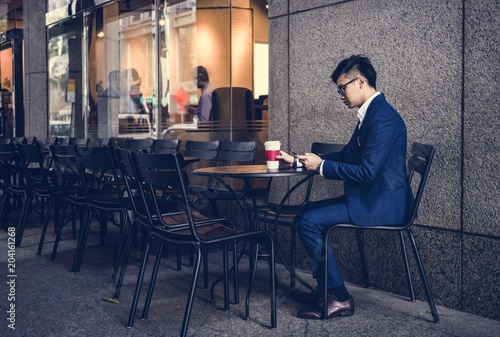 Asian businessman in a cafe