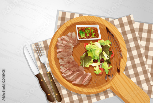 Steak and Salad on Wooden Board