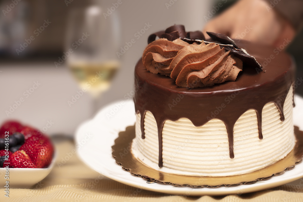 Chocoalate Ganache and Vanilla Cake decorated with Frosting and Chocolate Candy Chocoalate Ganache and Vanilla Cake decorated with Frosting and Chocolate Candy