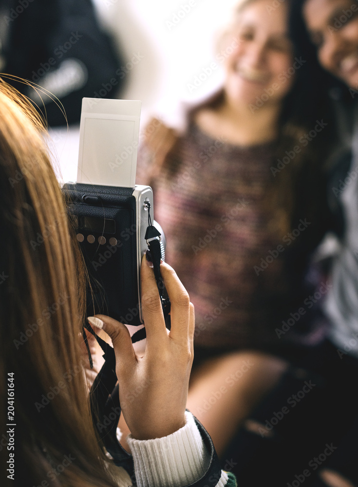 Φωτογραφία Teenager taking a picture of her friends hobby and photography concept