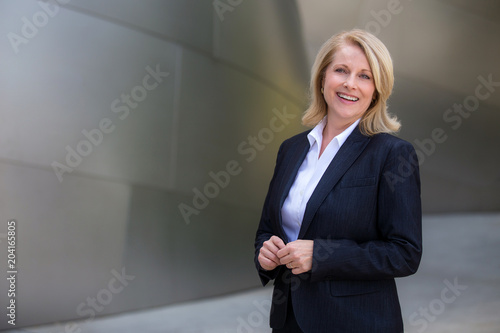 Modern female commercial business woman portrait, dressed with style, wealth, and success 