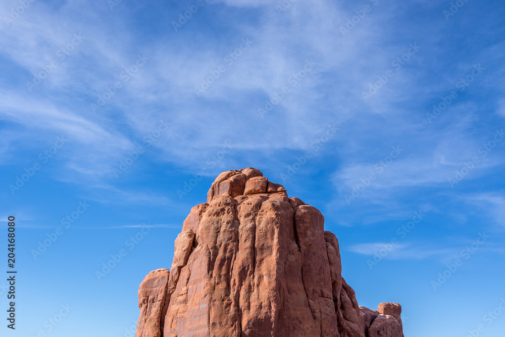 Fototapeta premium Orange rock against blue sky