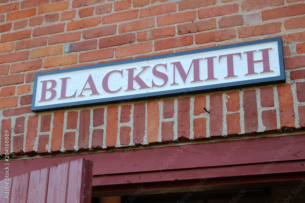 Blacksmith Sign on Old Building