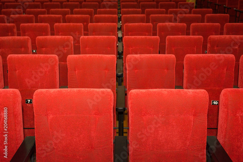 Seats in the cinema. Lots of seats in the hall.
