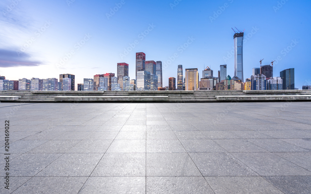 empty marble floor with panoramic city skyline