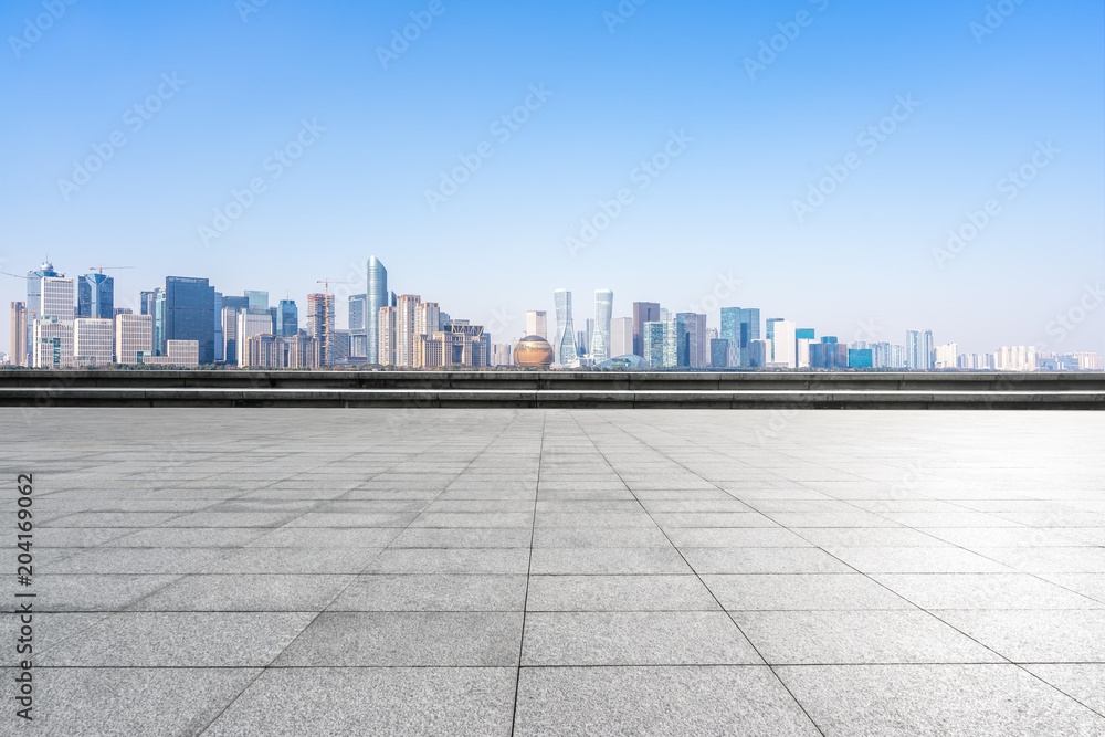 empty marble floor with panoramic city skyline