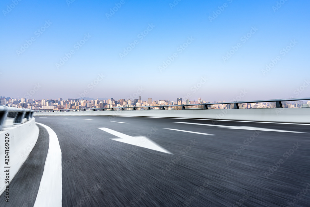 Fototapeta premium empty aspalt road with modern office building