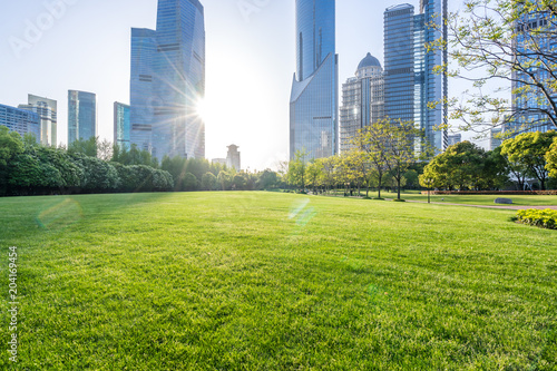 Photography modern office building with green lawn in shanghai park