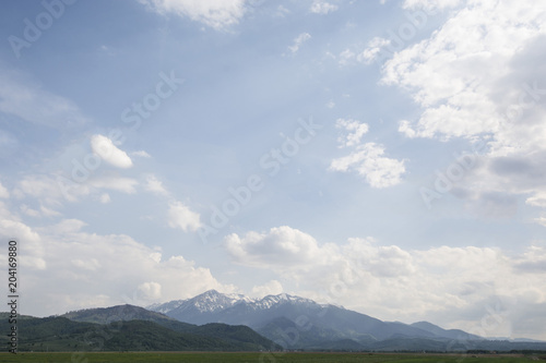 light, meadow, landscape, hill, green, nature, outdoor, travel, tree, summer, sky, scene, forest, mountain, background, beautiful, beauty, sunlight, bright, cloud, rural, scenery, tourism, blue, vacat