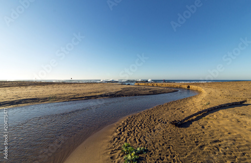  River Estuary Flowing Water and Patterned Sand Coastal Landscape