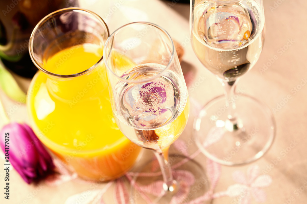 Two flute glasses filled with champagne Two flute glasses filled with champagne