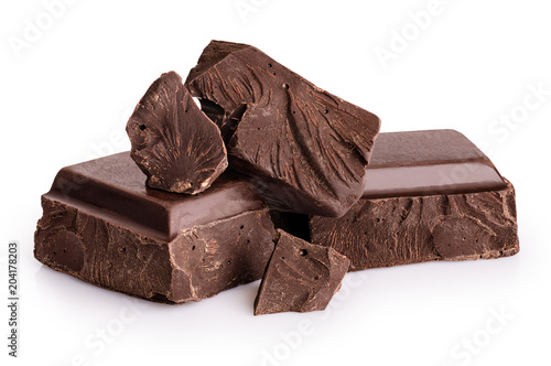 Fotografering Pieces of dark chocolate isolated on white background.