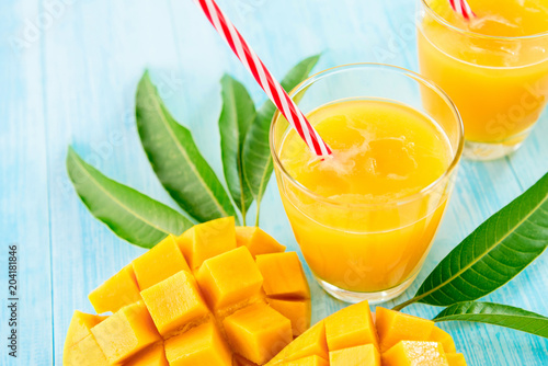 Refreshing cold mango juice drinks for summer