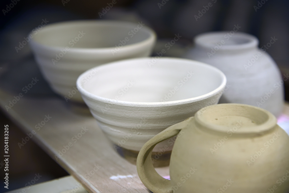 Pottery workshop, drying process at the end of molding before unglazed, Japan