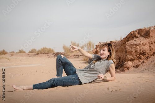 Girl have fun in desert in a day © keleny