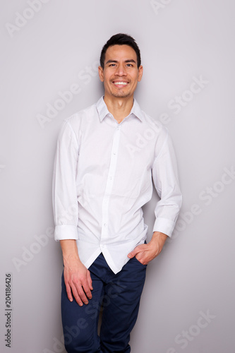 Smart middle aged asian man standing relaxed © mimagephotos