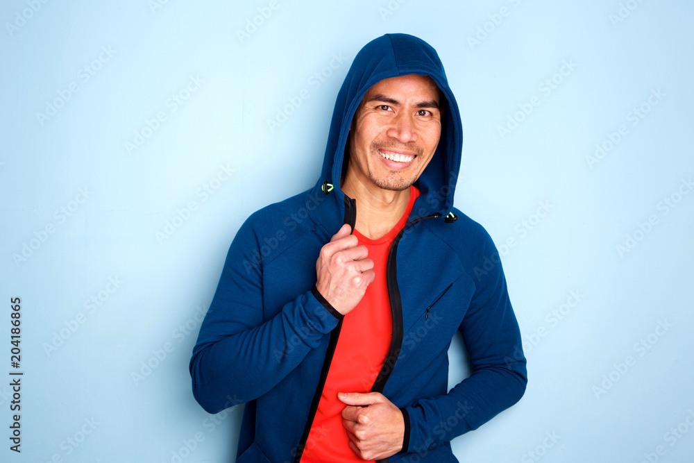 Happy mature asian man in stylish hoodie Happy mature asian man in stylish hoodie