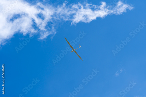 Glider in the blue sky