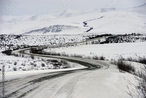 Dempster Highway in winter, year-round cleared gravel road, Yukon, Canada, North America photo