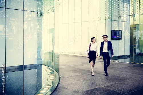 Photography Business people discussing while walking together