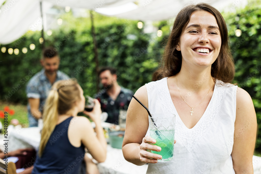 Group of diverse friends enjoying summer party together Group of diverse friends enjoying summer party together