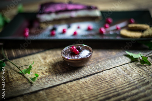 Homemade cheesecake with fresh berries and chocolate