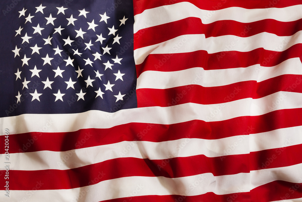 Fototapeta premium USA national flag with waving fabric 