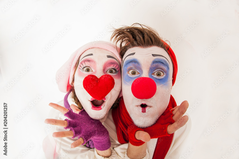 emotional and funny mime guy and girl posing on camera. Human emotions