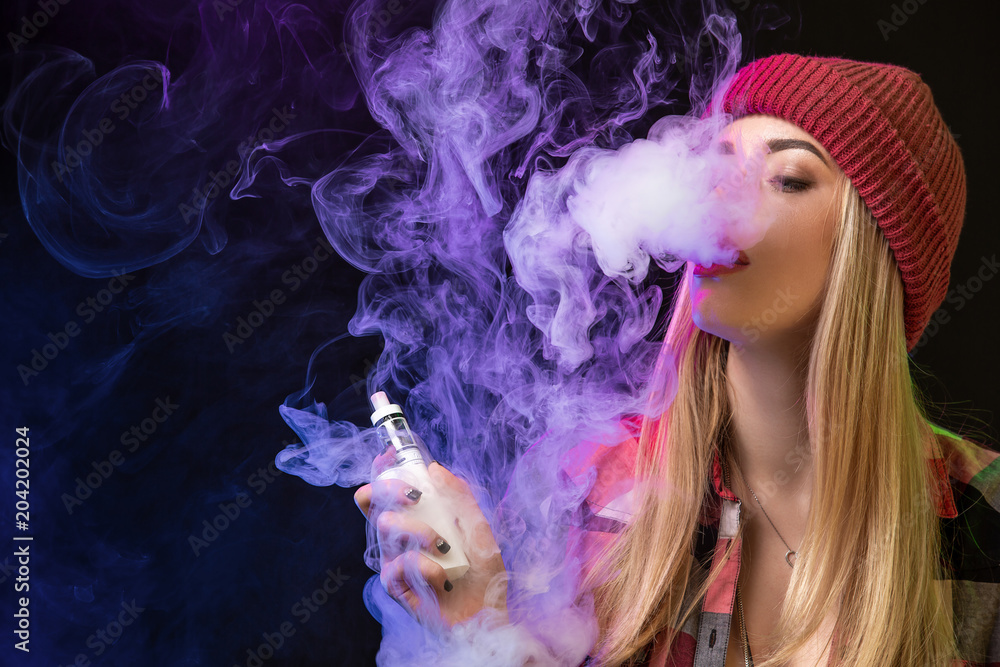 vaping-girl-young-hipster-woman-vape-e-cig-on-studio-on-black