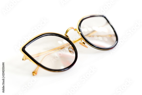 Female fashion glasses on white background