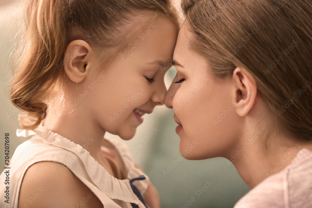 Portrait of happy mother and daughter at home, closeup Portrait of happy mother and daughter at home, closeup