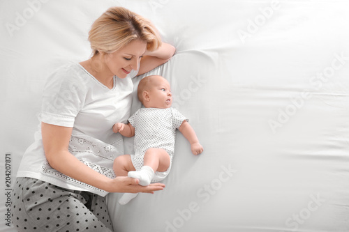 Young mother and her baby l...