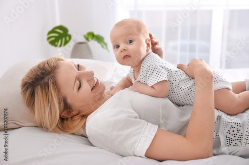 Young mother and her baby l...