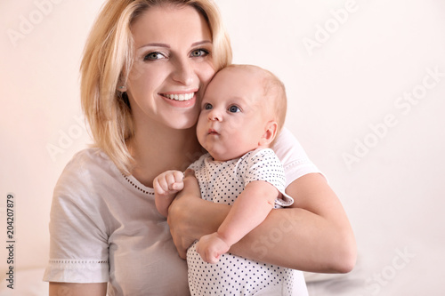 Young mother and her baby o...