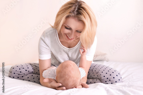 Young mother and her baby o...