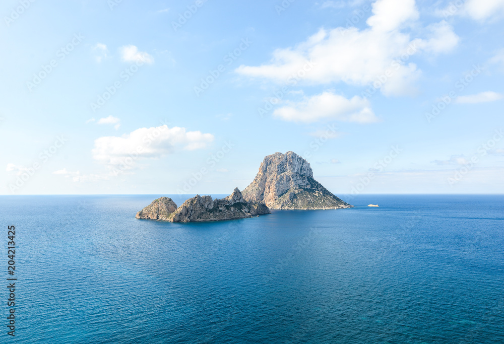 Ibiza, Spain - October 5, 2017 : Beautiful view of big stone island Es  Vedra of Ibiza, Balearic islands, Spain. Sea rest and holiday concept. View  from water. Popular summer resort. Stock Photo | Adobe Stock