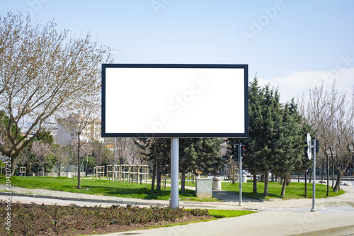 Large blank billboard located on the side of the road.