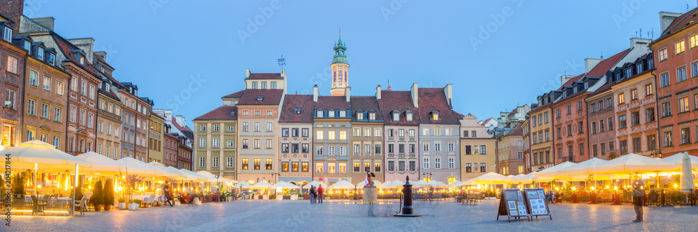 Panorama of old town square in Warsaw at lovely summer evening
