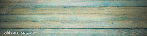 horizontal panoramic retro grunge background made of wooden planks with vignette
