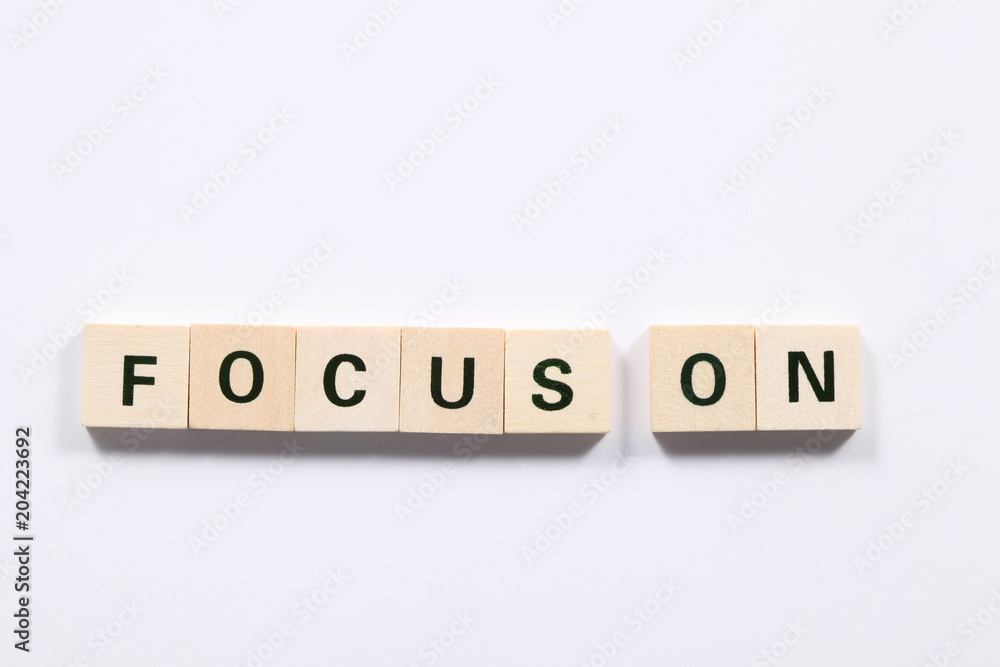 words focus on made of wooden block isolated on white background words focus on made of wooden block isolated on white background
