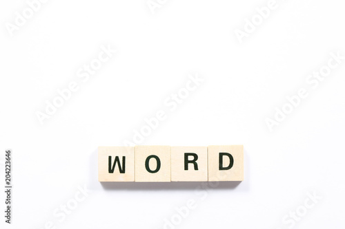 word . made of wooden block isolated on white background