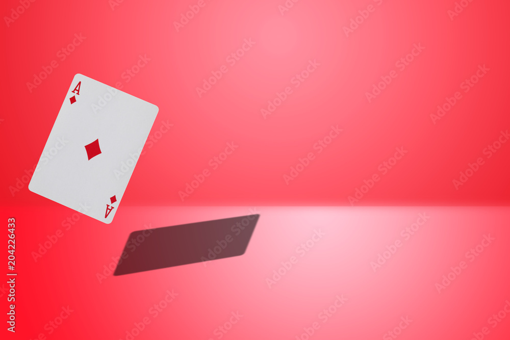 diamond ace card flying on a red background diamond ace card flying on a red background